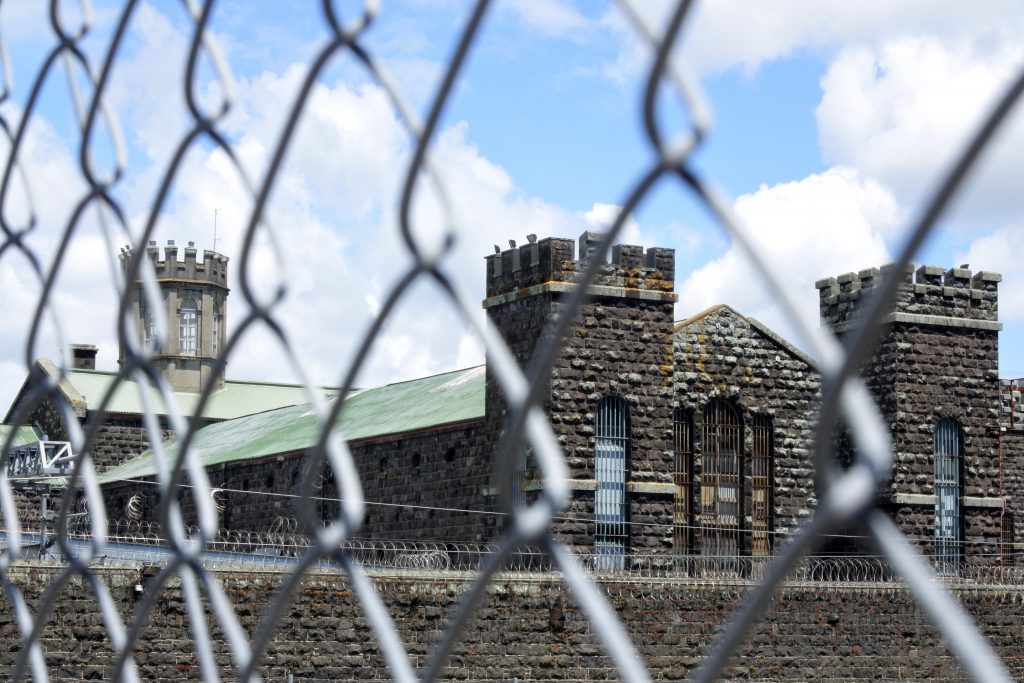 wire fence with building behind